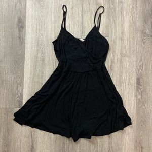 garage black romper with spaghetti straps and overlapping chest